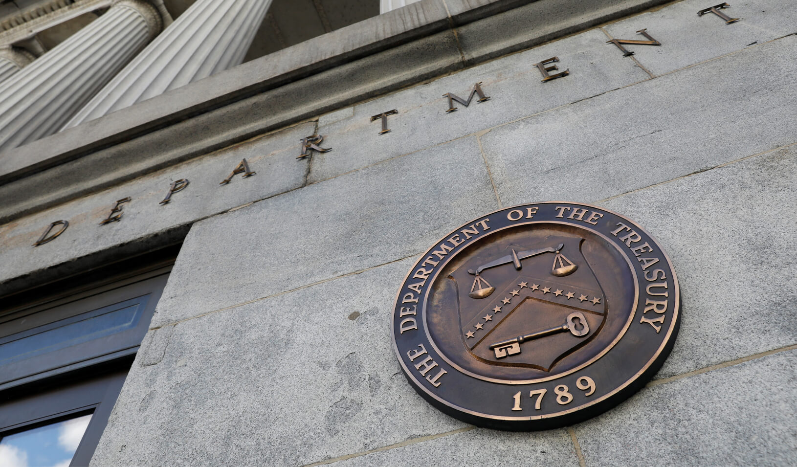 Signage outside U.S. Department of the Treasury headquarters in Washington, D.C. Credit: Reuters/Andrew Kelly