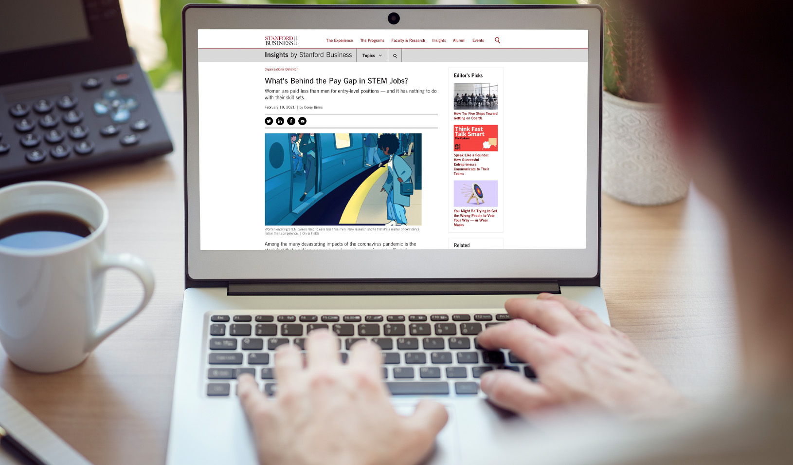 A person working on a computer, reading the Insights articles page on the Stanford GSB web page. | Credit: iStock/BrianAJackson.