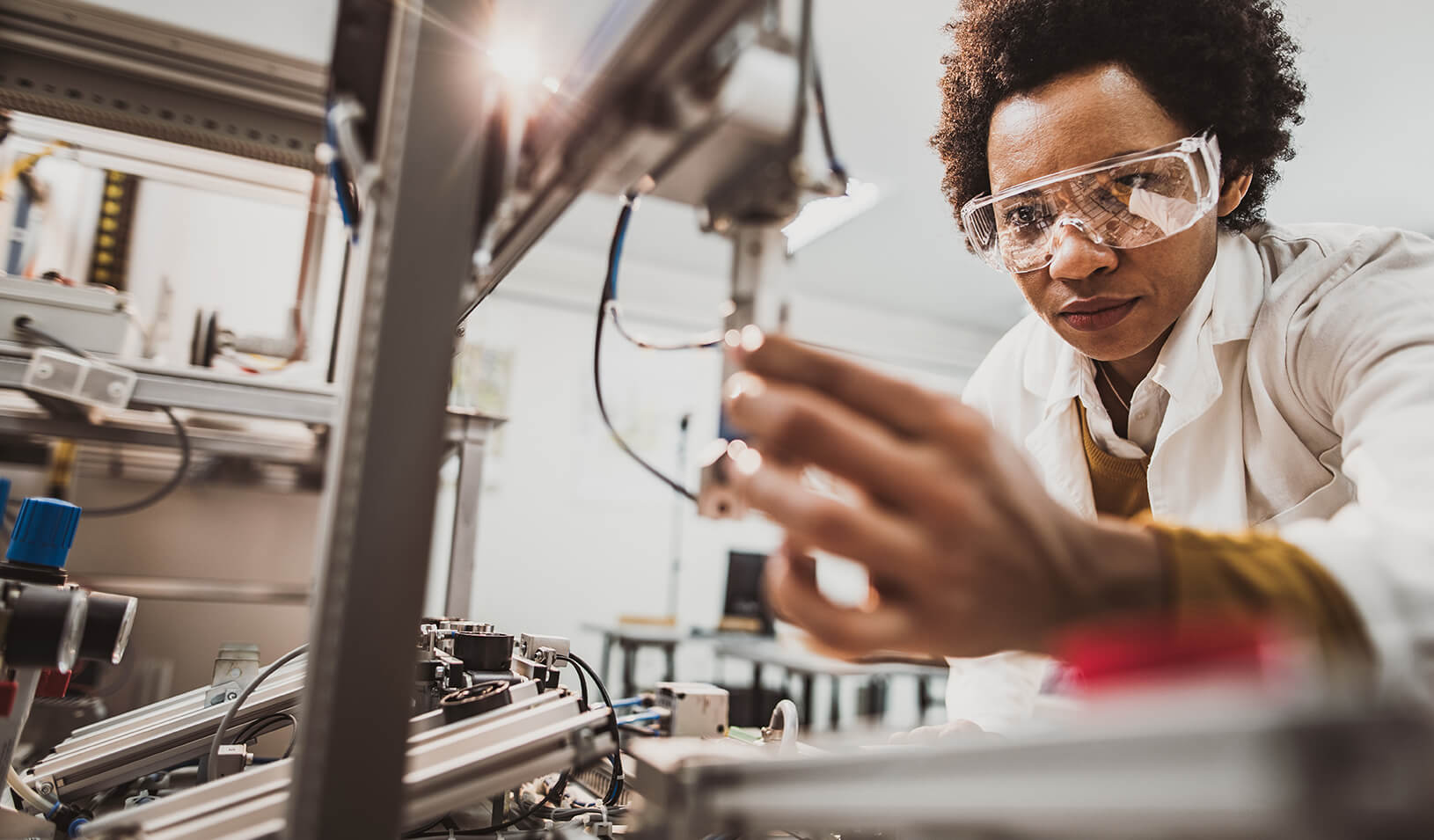 A female engineer working in a technology lab. Credit: iStock/skynesher