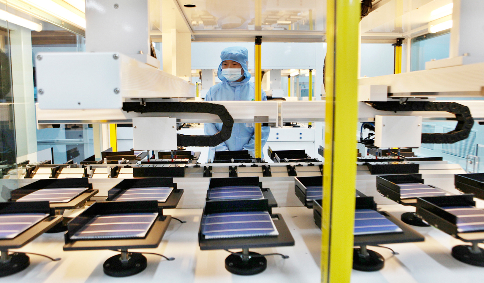 A worker in a Shanghai Chaori Solar Energy Science & Technology factory | Reuters/Stringer