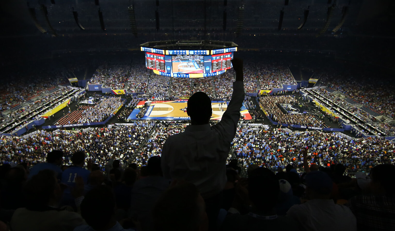 A fan cheers his team from the crowds | Kevin Jairaj - USA TODAY Sports/Reuters 