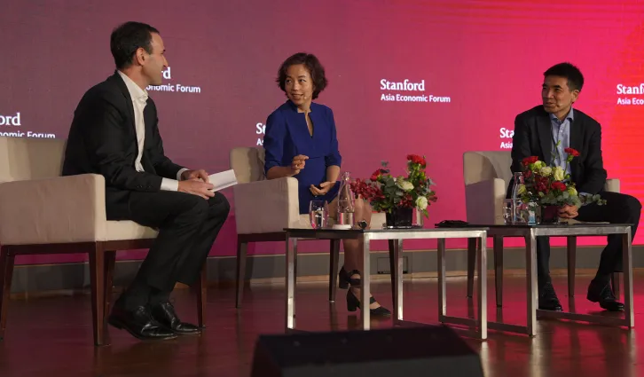 Jon Levin in conversation with Fei-Fei Li and Eric Yuan at the Stanford Asia Economic Forum.