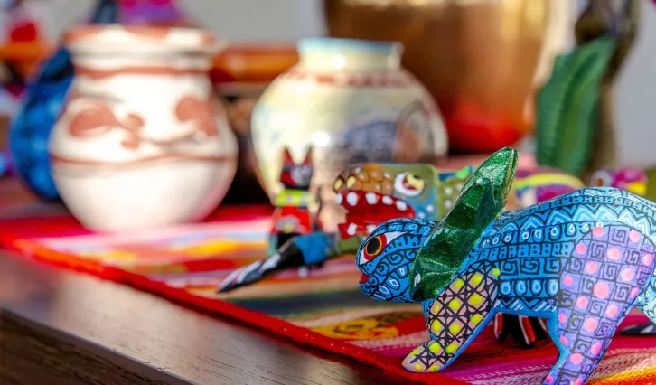 A table displaying handcrafted Indigenous art pieces