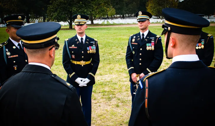 Stanford GSB Alumni Eric Hanft in military uniform, leading a rehearsal before of a large military funeral in Arlington National Cemetery.. Photo Courtesy of Eric Hanft