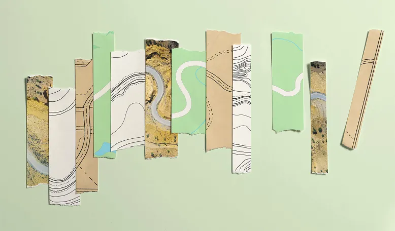 Illustration of various cuttings of a map, pieced together to form a larger map that shows a road curving along it. Illustration by Tyler Comrie