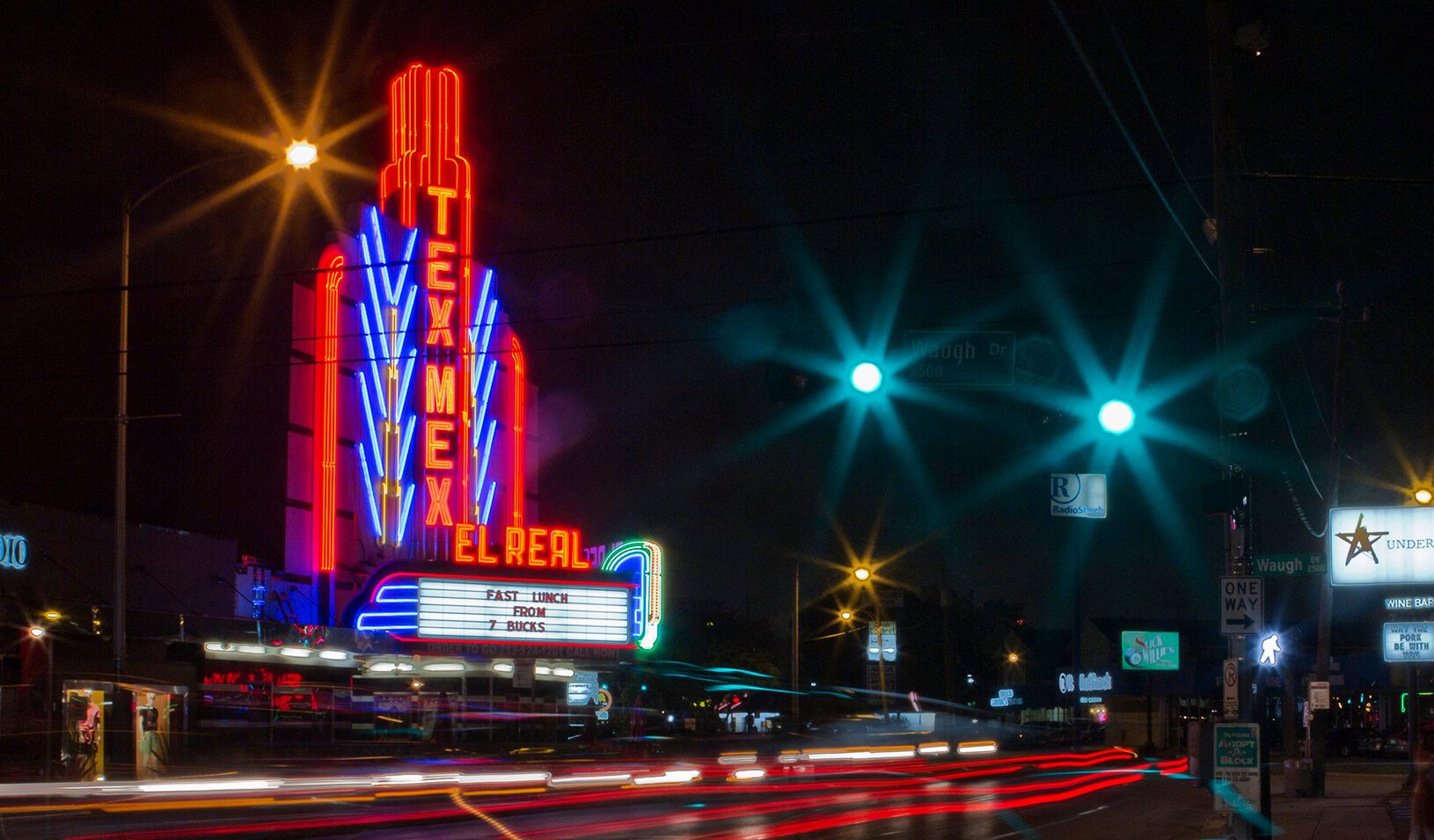 Superstar Chef Bryan Caswell&#039;s Tex-Mex food haven El Real occupies a converted movie theatre and lights up Westheimer street in Houston| REUTERS/Richard Carson